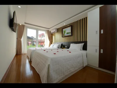Habitación triple Deluxe — Hanoi Golden Hostel